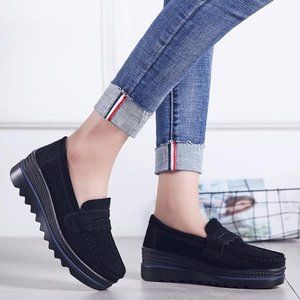Black platform loafers